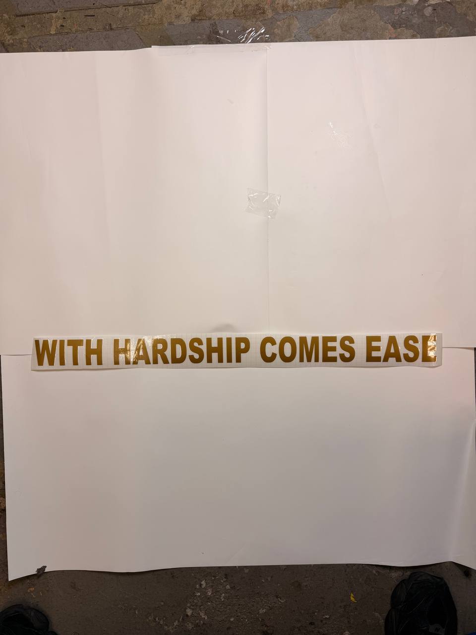 “WITH HARDSHIP COMES EASE”